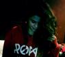 Selena Gomez aparece sensual em cima de uma cama e vestindo a roupa do rapper Romeo Miller. É namoro ou amizade?!