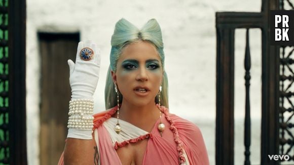 O momento difícil pelo qual Lady Gaga estava passando quando escreveu o "Chromatica" transparece em algumas canções do álbum, como em "911", em que ela fala sobre ser sua maior inimiga