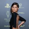 No Bola de Ouro, Zendaya usou um vestido preto do Roberto Cavalli que tinha uma coluna vertebral dourada nas costas feita por Fausto Puglisi