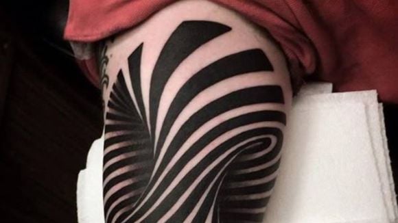 9 tatuagens com ilusões de ótica que vão dar um nó na sua cabeça