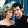 Em "Grease", Sandy (Olivia Newton-John) muda para agradar um macho, mas acha sua confiança também 