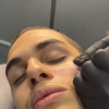 Fã da Anitta choca web ao fazer tatuagem com referência ao "c*" da cantora