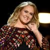 Fã de Adele descobre faixa inédita composta por ela e Taylor Swift no site da SESAC