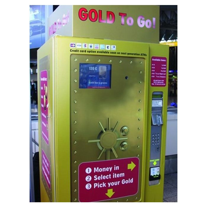 A máquina da foto vende moedas de ouro na Alemanha.