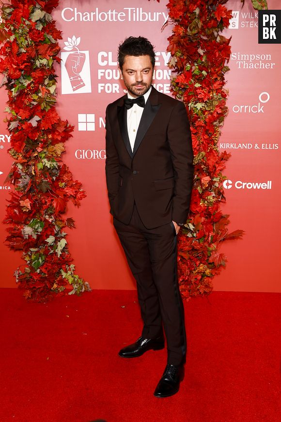 Dominic Cooper em evento de George Clooney