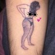Essa na tatuagem é a Anitta, mesmo que não pareça muito