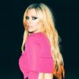 Avril Lavigne cita 3 hits que vai sempre cantar, dá dicas para mulheres na música e mais
