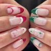 Nail art vermelha e/ou verde são as melhores opções para o Natal