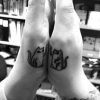 Com essa tatuagem você pode sair por aí dizendo que seu amigo é o maior gatinho! (risos)