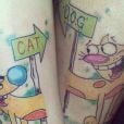  Se você e seu amigo vivem brigando como cão e gato, essa tatuagem é uma ótima escolha 