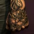 Até os gatos mais ferozes também são homenageados em forma de tatuagem