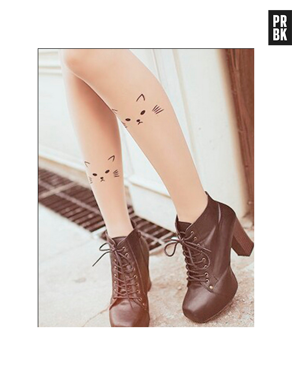 Olha só que charme essa tatuagem de gatinho na perna!