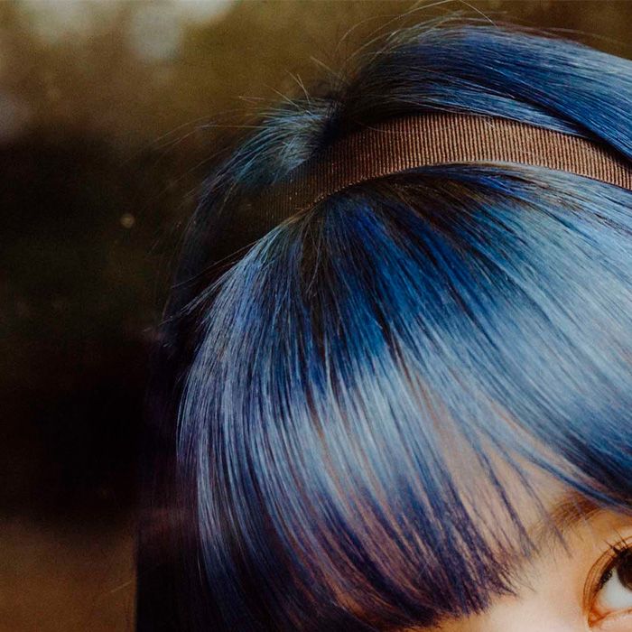 O cabelo azul não é novidade para Momo, do TWICE