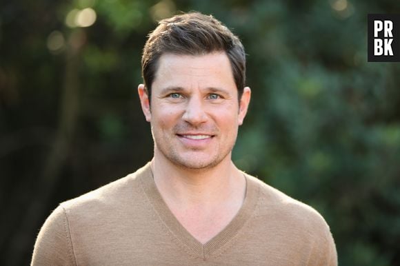 Nick Lachey acessou seu perfil no Twitter e admitiu que "exagerou", mas ainda assim negou ter feito contato físico com o fotógrafo.