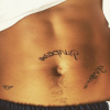 Justin Bieber também levou os fãs ao delírio ao postar sua nova tatuagem no abdômem