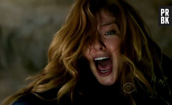 Julia (Rachelle Lefevre) se desespera ao ver Barbie (Mike Vogel) caindo no túnel em "Under The Dome"