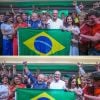 Manifestantes levantaram a bandeira do Brasil na posse do Presidente Lula, recuperando o símbolo nacional