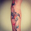 Os pássaros sçao sucesso entre as tatuagens em aquarela