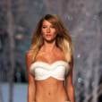  Em 2002, Gisele B&uuml;ndchen foi eleita a dona do quarto corpo mais bonito do mundo, perdendo somente para Brad Pitt, Madonna e Benjamin Bratt 