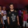 Caio Castro se divertiu na primeira noite do Rock in Rio 2015 e beijou muito!