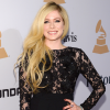 Avril Lavigne é uma baixinha de 1,58m