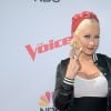 Quem também é do time de baixinhas é Christina Aguilera, com seus 1,57m