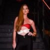 Marina Ruy Barbosa usou macacão com recortes e iniciais da YSL em metal na frente criam um efeito cut-out