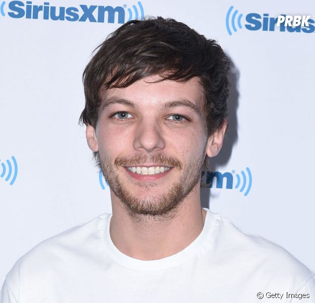 Louis Tomlinson, do One Direction, assina contrato com gravadora de Simon Cowell