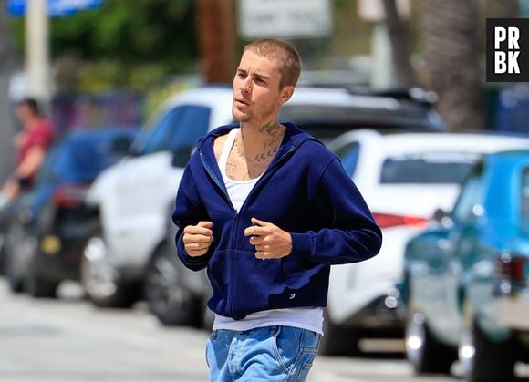 Justin Bieber faz grave ameaça de agressão contra paparazzo e vídeo choca web: "Quebrar seu pescoço". Assista!