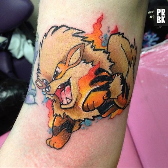 O Arcanine é um ótimo "Pokémon" pra ter tatuado