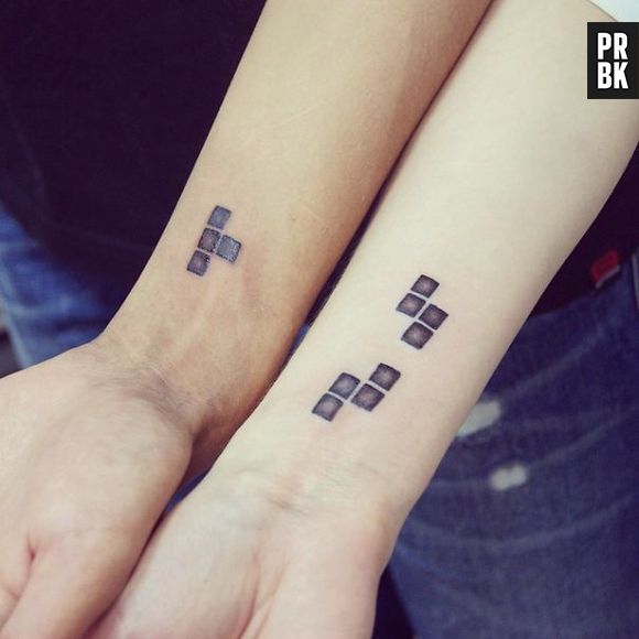 Os geeks também fazem tatuagens em casal