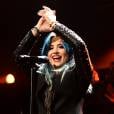 Demi Lovato levou para casa dois troféus do People's Choice Awards 2014: "Artista Feminina Favorita" e "Melhores Fãs"